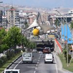 A bustling street scene in Malatya, Turkey featuring iconic apricot sculpture and cityscape. — 3 Myths About knee arthritis A