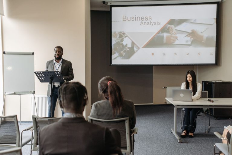 Business seminar with a speaker and audience in a conference room. — An Insider's Look at CVV Shops