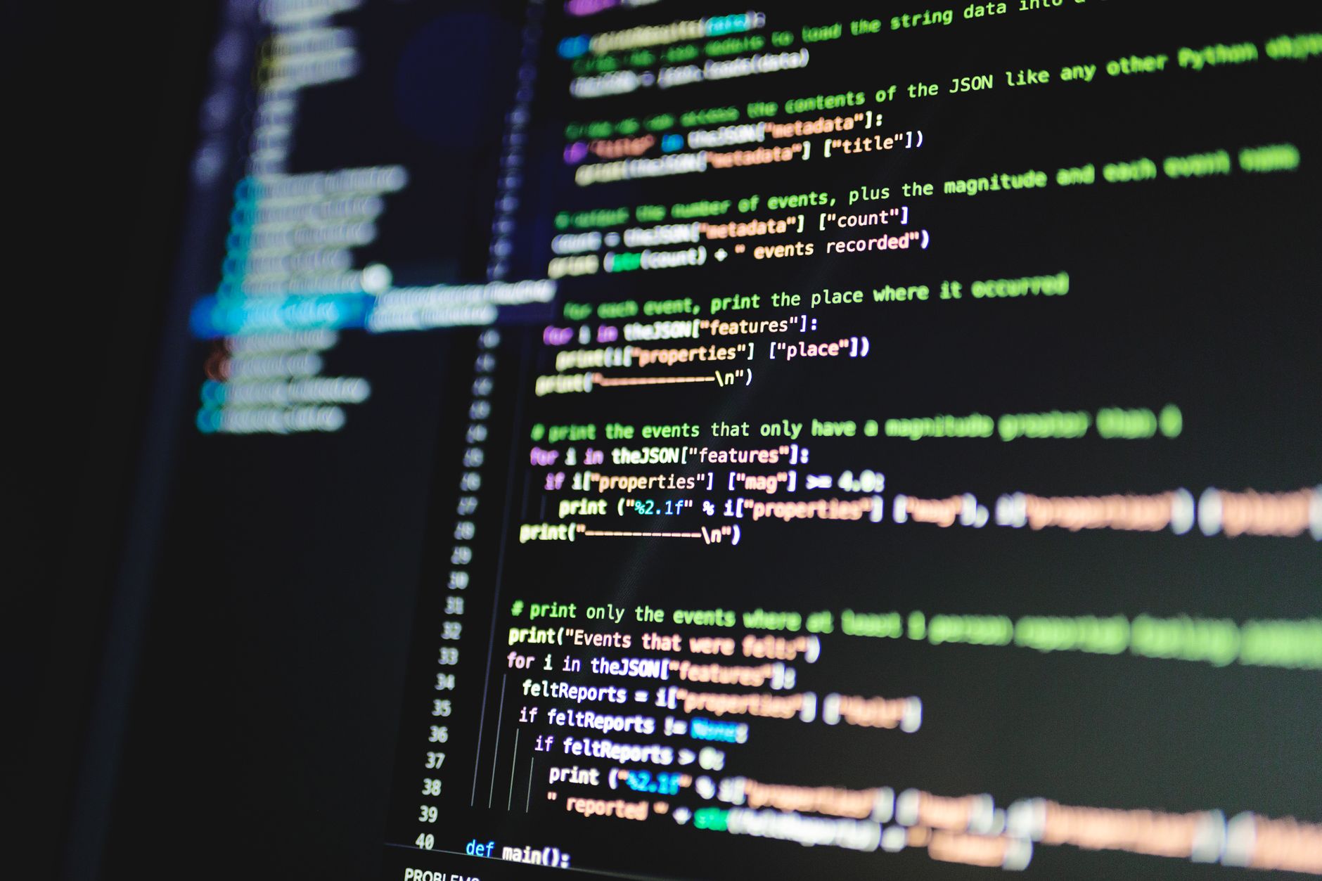 Close-up of colorful programming code displayed on a computer monitor with a dark background. — Current innovation use instan