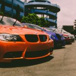 Close-up of vibrant sports cars parked outdoors, showcasing custom modifications and sleek designs. — Hiding Your Wires from