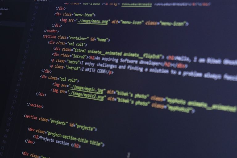 HTML and CSS code on a computer monitor, highlighting web development and programming. — How to boost internet speed