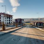 Quiet suburban street with modern apartments and a scenic view in Palu, Elazığ, Türkiye. — HOW TO GET LOAN AGAINST PROPERTY E