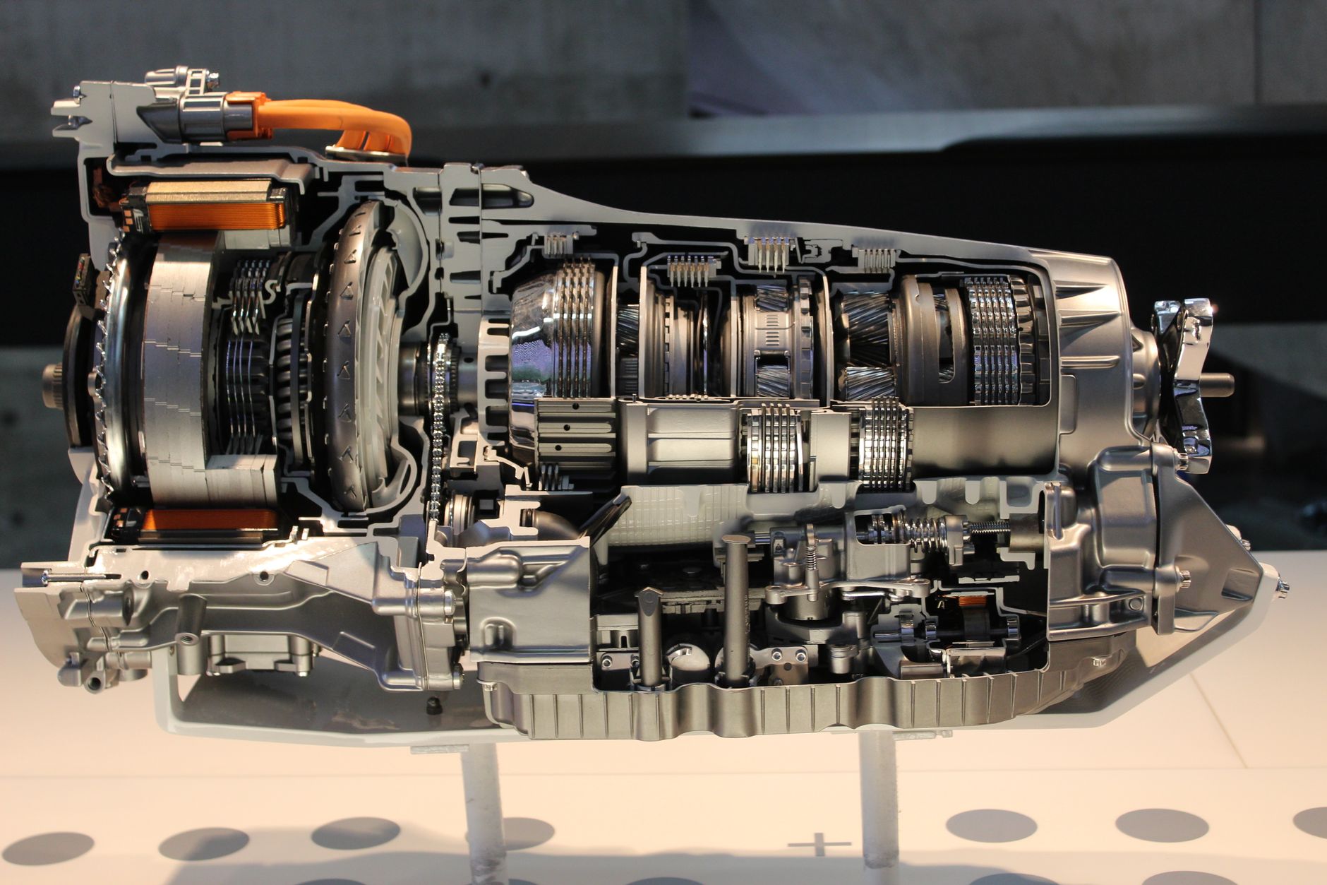 Detailed view of a car transmission cutaway, showcasing internal mechanisms. — How to Retouch Photos in Photoshop?