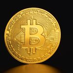 Close-up of a golden Bitcoin coin on a dark background symbolizing cryptocurrency and digital finance. — Learn the reasons wh