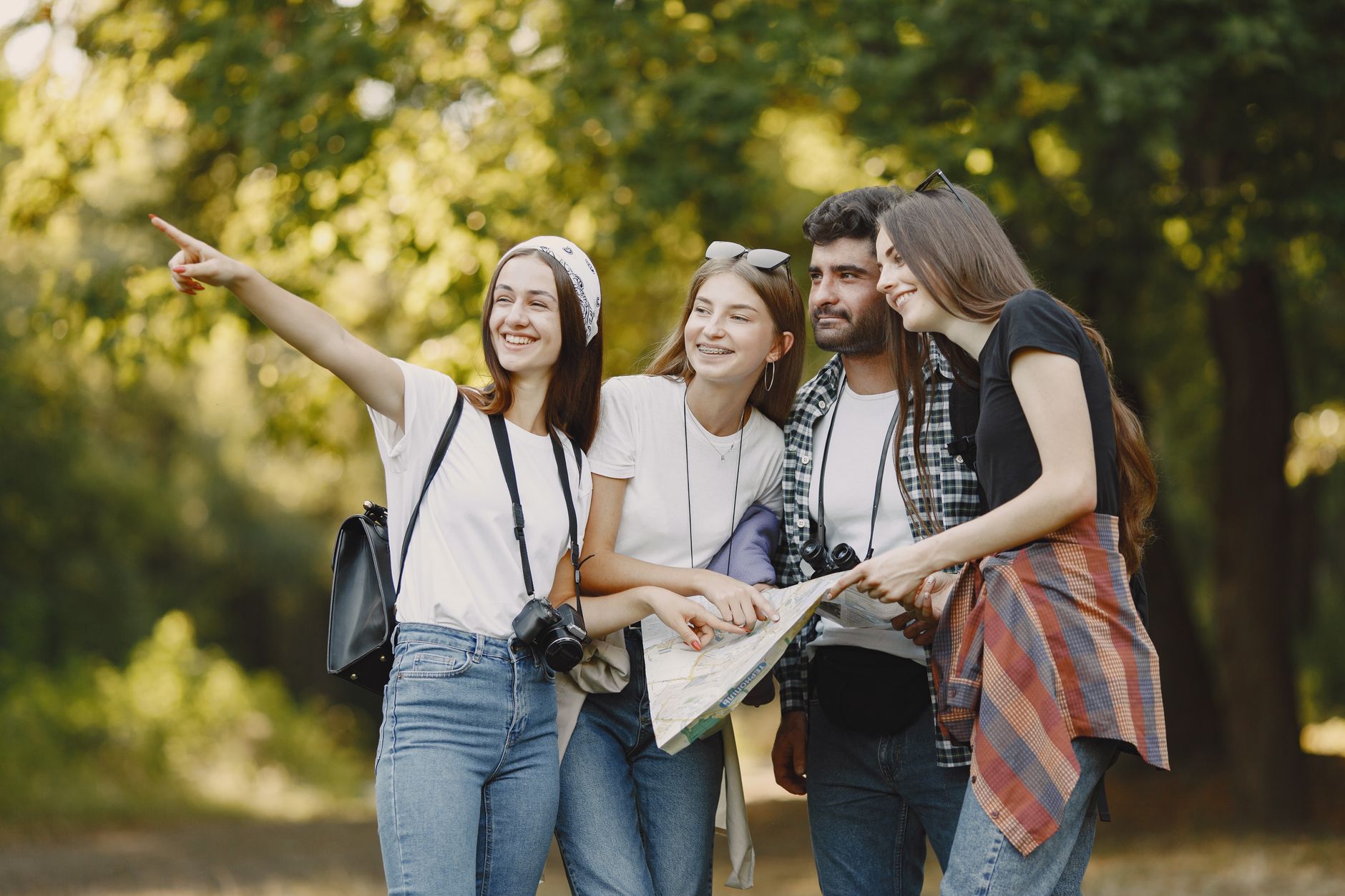 Young friends exploring a park with a map, smiling and enjoying the outdoors. — Popular kinds of blankets