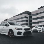 White sports cars showcased in a modern urban background, perfect for automotive enthusiasts. — Protect the car from dust and