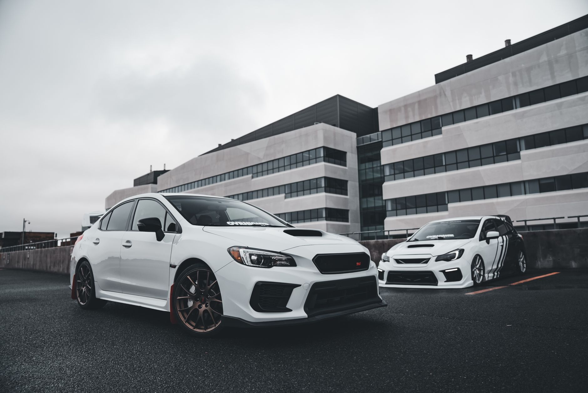 White sports cars showcased in a modern urban background, perfect for automotive enthusiasts. — Protect the car from dust and