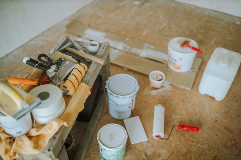 Overhead shot of tools and paint supplies for a home renovation project. — Style Guide: How To Decorate Old Almirah At Home I