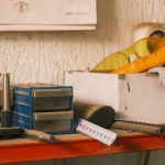 Collection of vintage tools on a wooden table indoors with a retro vibe. — The Best Ways to Light Up Your Home with LED Ribbo
