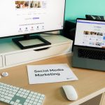 Stylish workspace with laptop and monitor for social media marketing. — The Ripple Effect: How Instagram Views Drive Virality