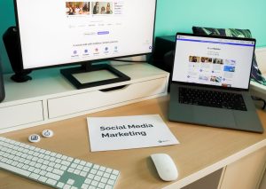 Stylish workspace with laptop and monitor for social media marketing. — The Ripple Effect: How Instagram Views Drive Virality