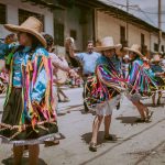 Vibrant parade in Cajamarca, Peru, with traditional costumes and lively atmosphere. — Tricks To Celebrate A Cheap Birthday An