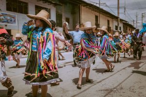 Vibrant parade in Cajamarca, Peru, with traditional costumes and lively atmosphere. — Tricks To Celebrate A Cheap Birthday An