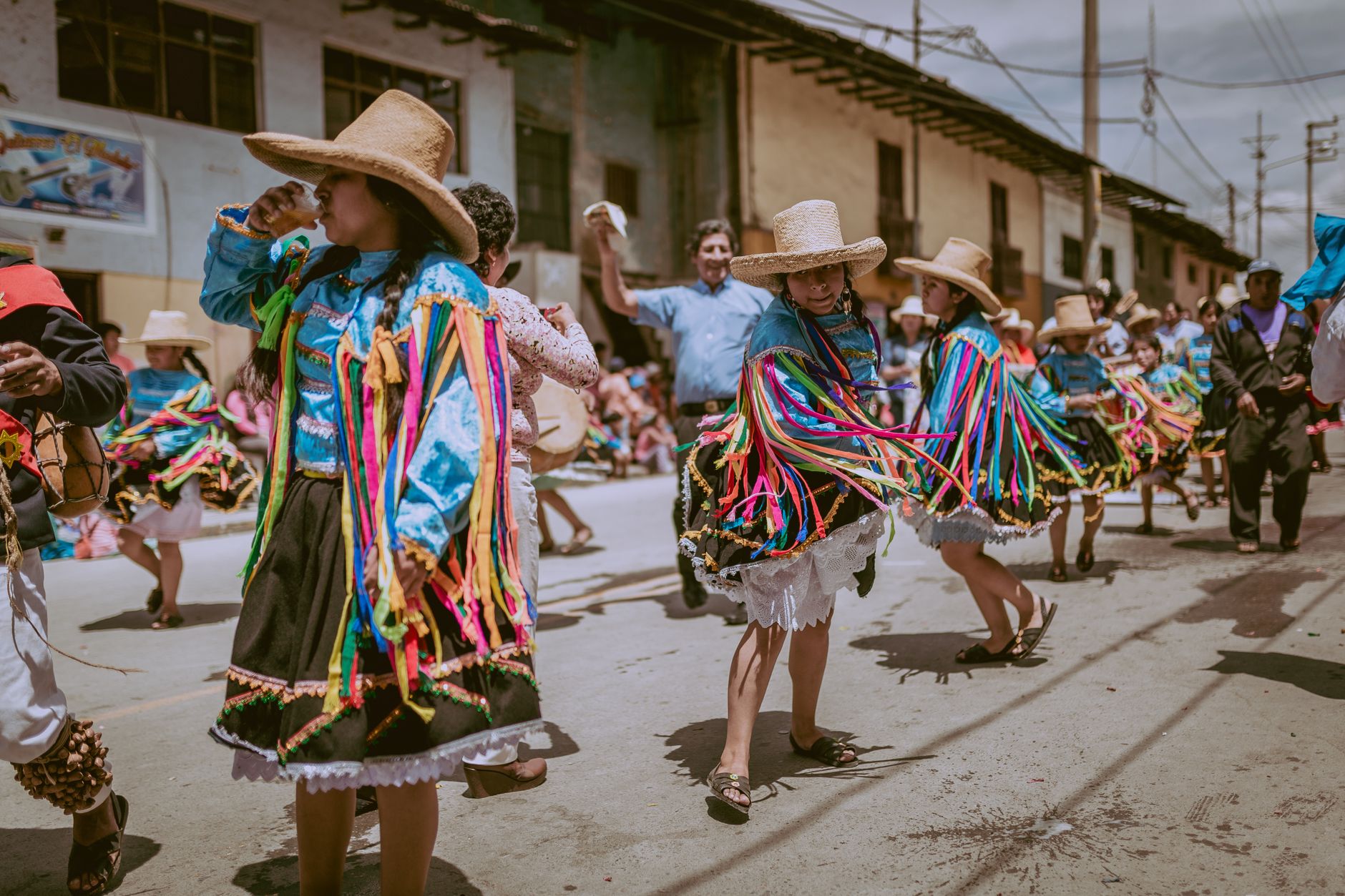 Vibrant parade in Cajamarca, Peru, with traditional costumes and lively atmosphere. — Tricks To Celebrate A Cheap Birthday An