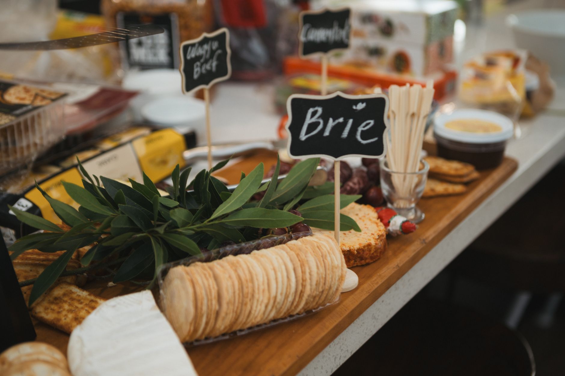 A delicious gourmet cheese platter featuring Brie cheese, crackers, and charcuterie. — Turkish Cuisine: Mouthwatering and Nut