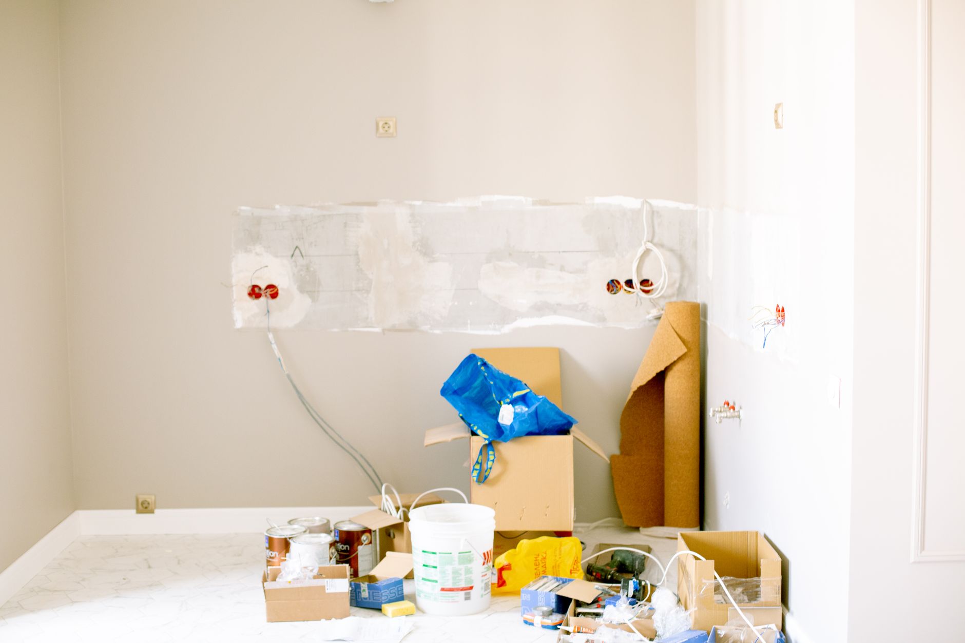 A room undergoing renovation with tools, supplies, wiring — What All Are The Various Handyman Jobs In Summerlin South, NV?