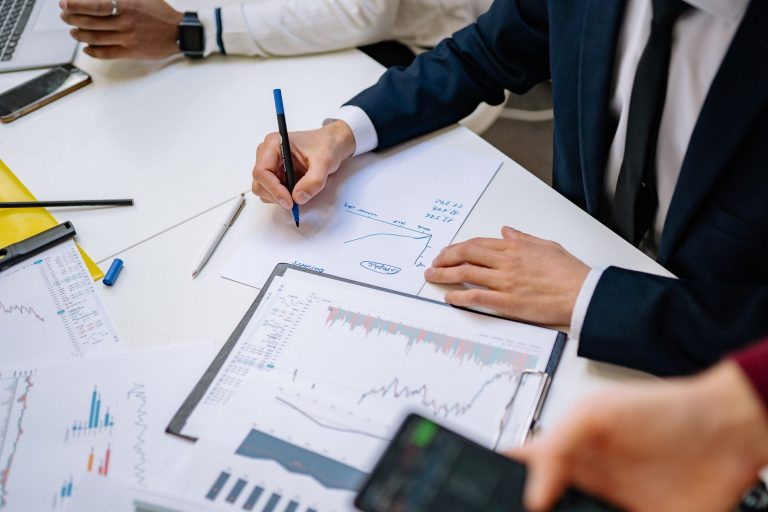 Professionals analyzing financial charts in a corporate setting. — What You Need to Know About Arlington's Best Locksmith